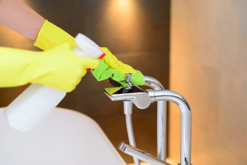 Local technician inspecting a pet stain in a Mayfair apartment