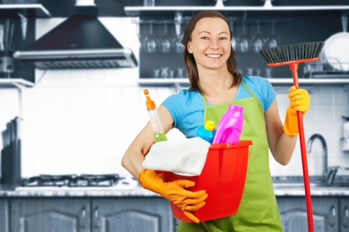 End of tenancy cleaning team working in a Mayfair apartment kitchen